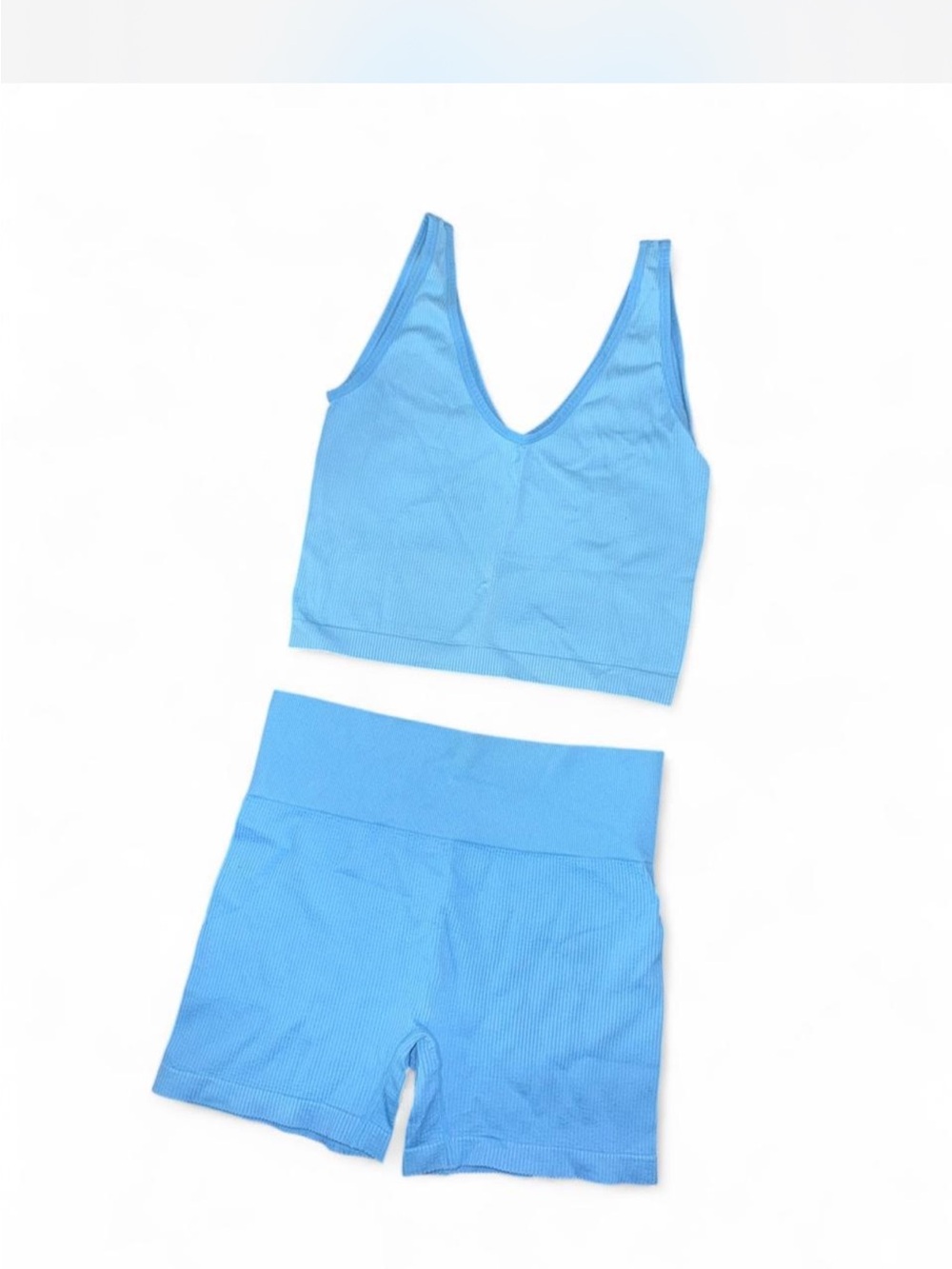 Colsie ribbed two-piece set V-neck tank top and matching high-waist bike shorts.